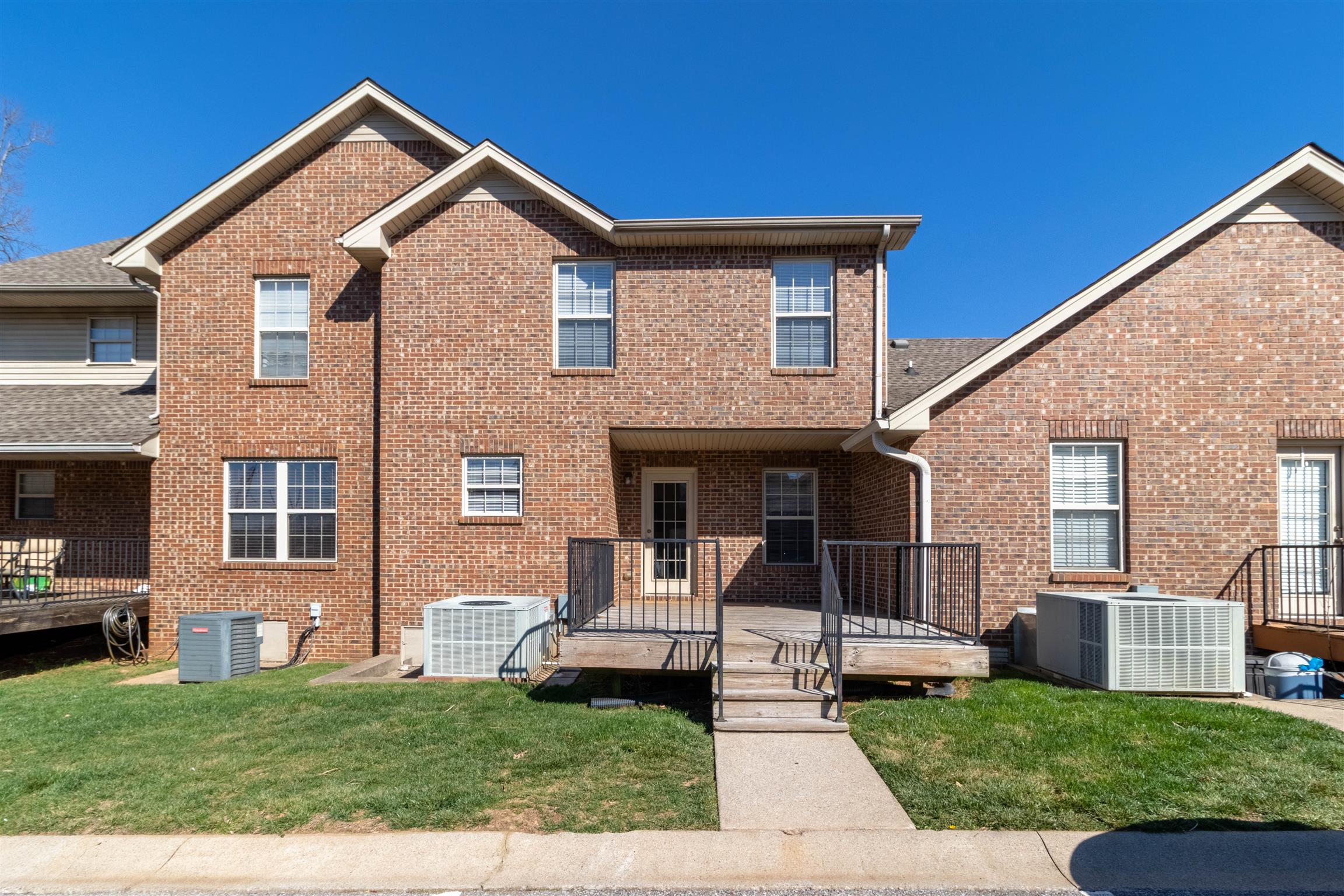 135 Excell Road, Unit 502 Clarksville, TN 37043 - Photo 22 of 22 a front view of a house with a yard