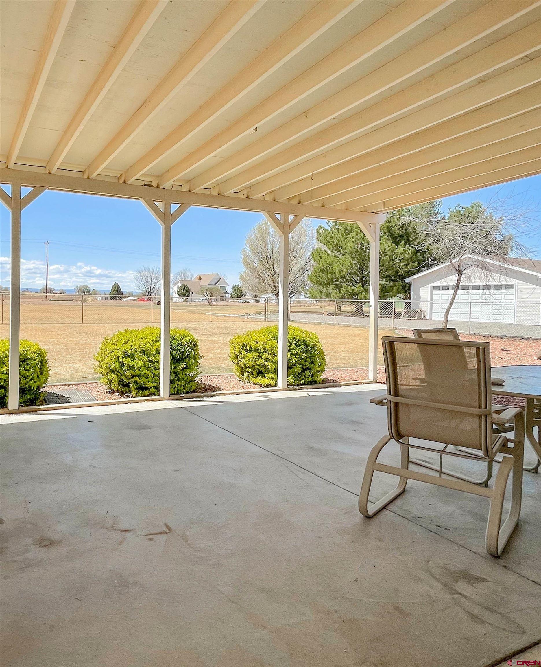 2535 1585 Road Delta, CO 81416 - Photo 28 of 35 a view of a room with furniture and a yard