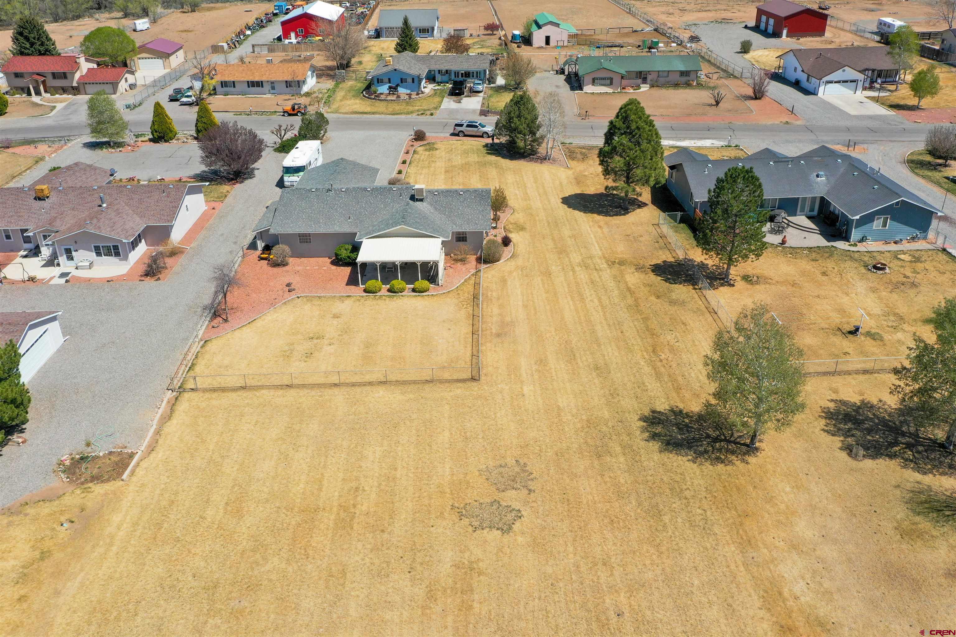 2535 1585 Road Delta, CO 81416 - Photo 31 of 35 an aerial view of residential houses with outdoor space