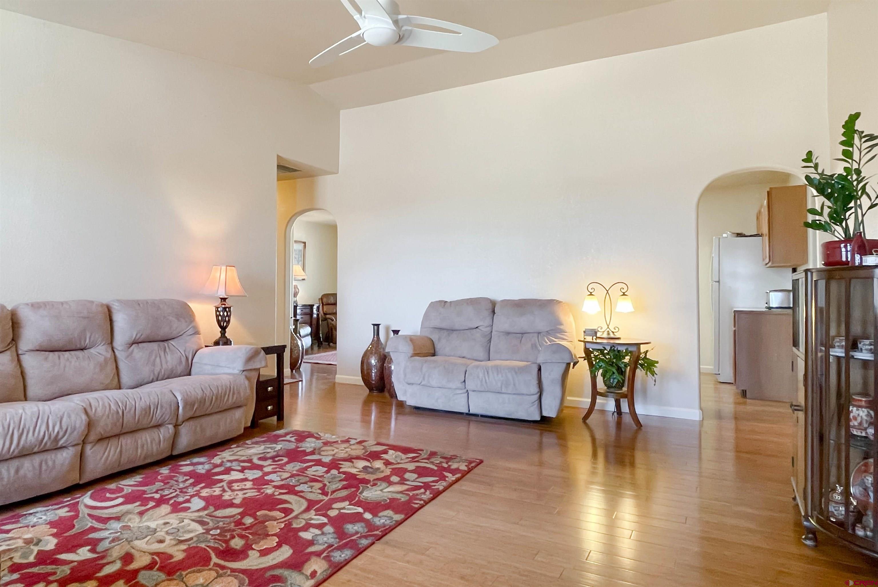 2535 1585 Road Delta, CO 81416 - Photo 4 of 35 a living room with furniture and a rug