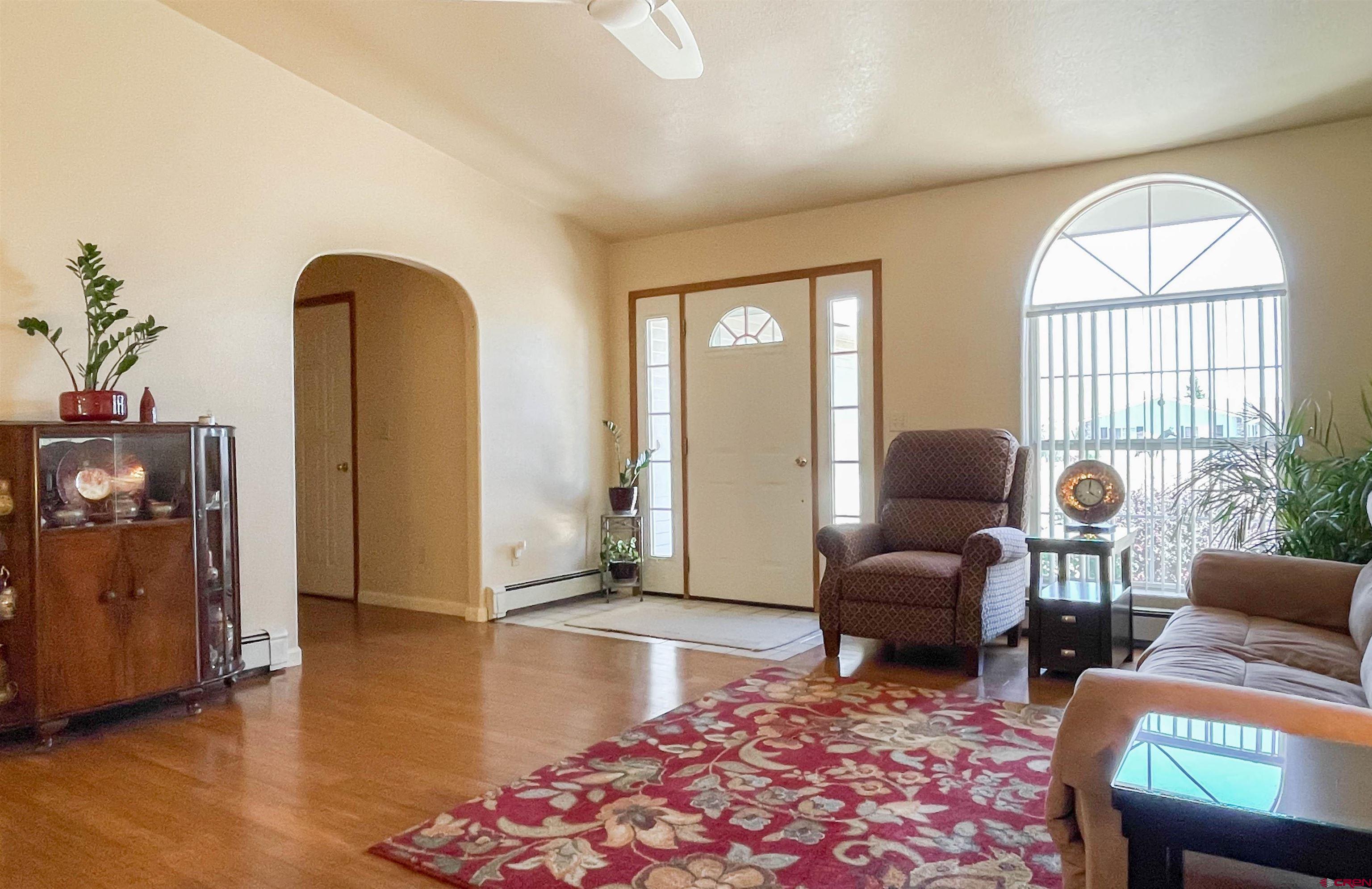 2535 1585 Road Delta, CO 81416 - Photo 5 of 35 a living room with furniture and a window