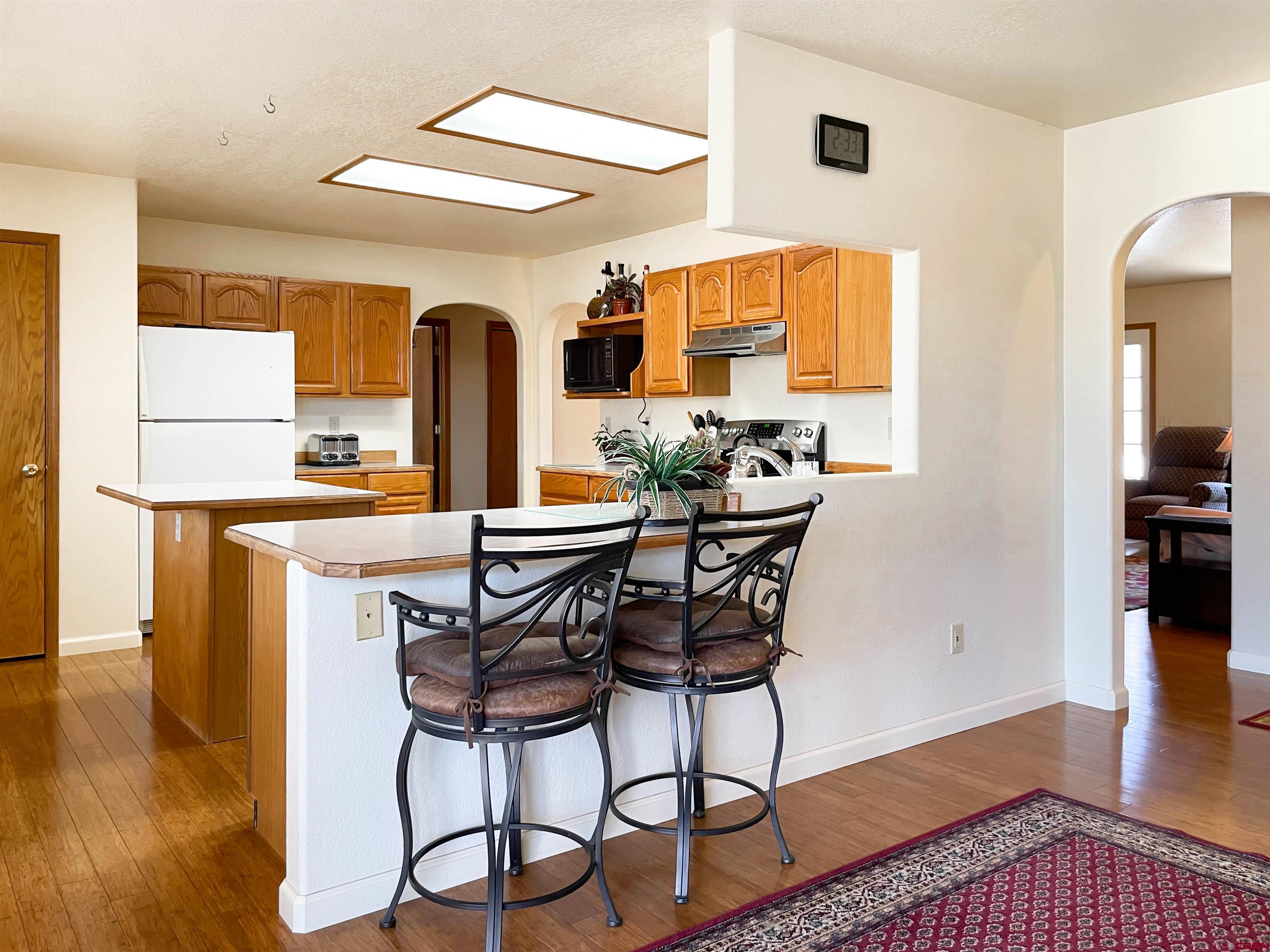 2535 1585 Road Delta, CO 81416 - Photo 9 of 35 a view of a dining room with furniture and wooden floor