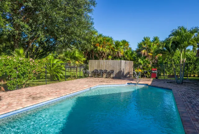 a view of a house with a big yard