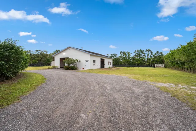 a view of a backyard with garden