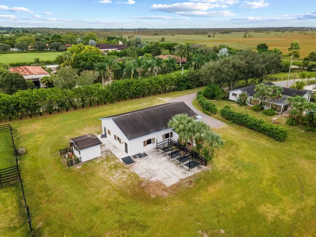 a view of an outdoor space pool patio and lake view