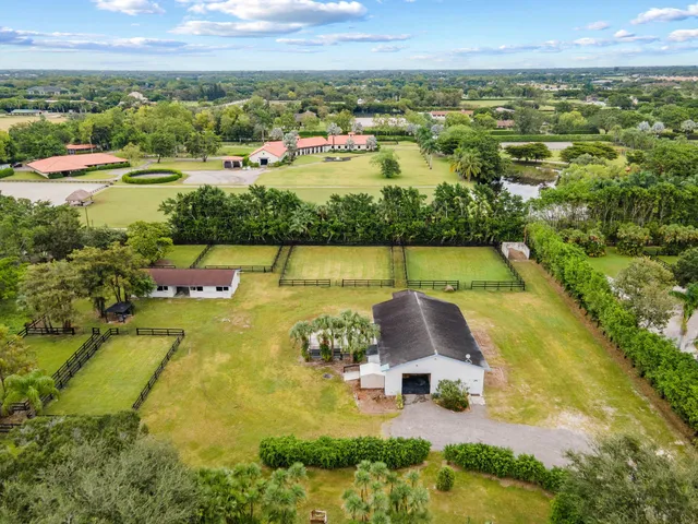 a view of park with wooden fence