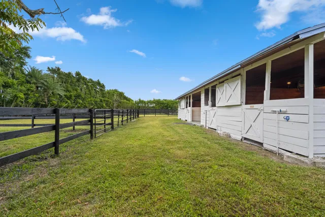 a view of a livingroom with furniture and window