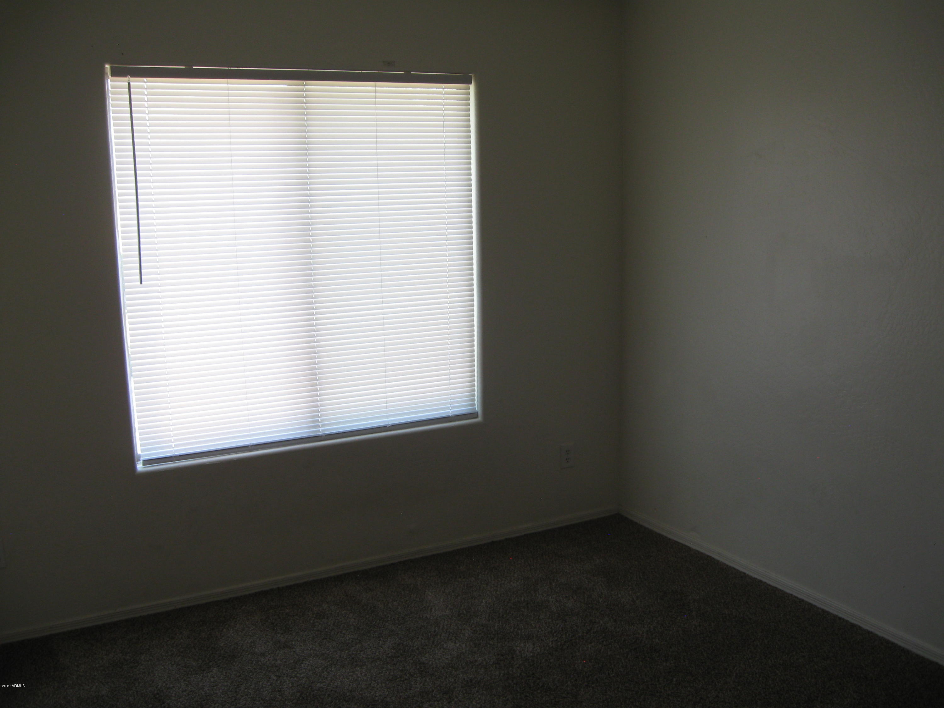 8746 West Heber Road Tolleson, AZ 85353 - Photo 27 of 36 a view of a small space with window