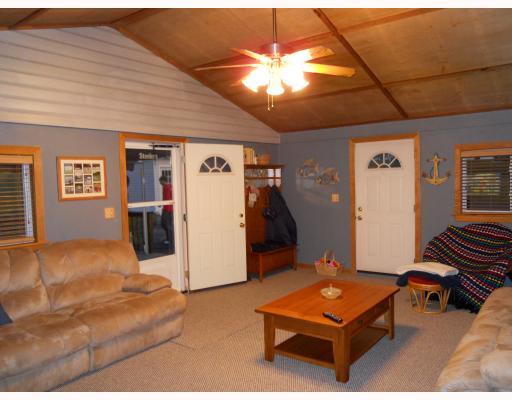 Den/Family/Great Room. Cathedral ceiling in this beautiful family room, newer carpeting and nice light fixture.