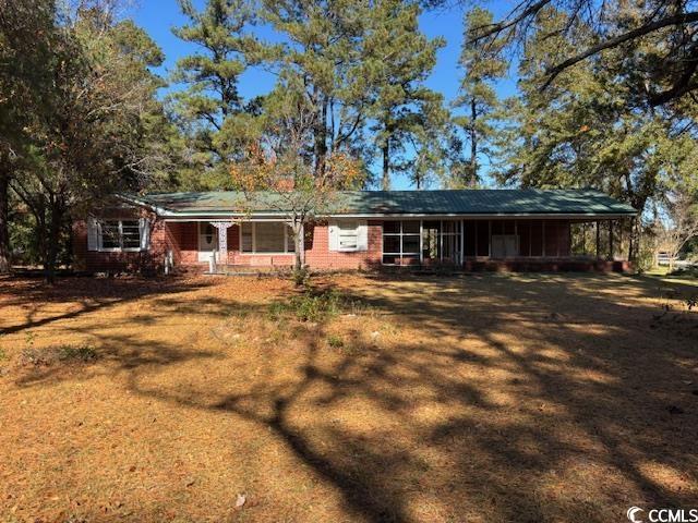 6800 State Rd S-26-266 Nichols, SC 29581 - Photo 1 of 20 View of front facade with covered porch