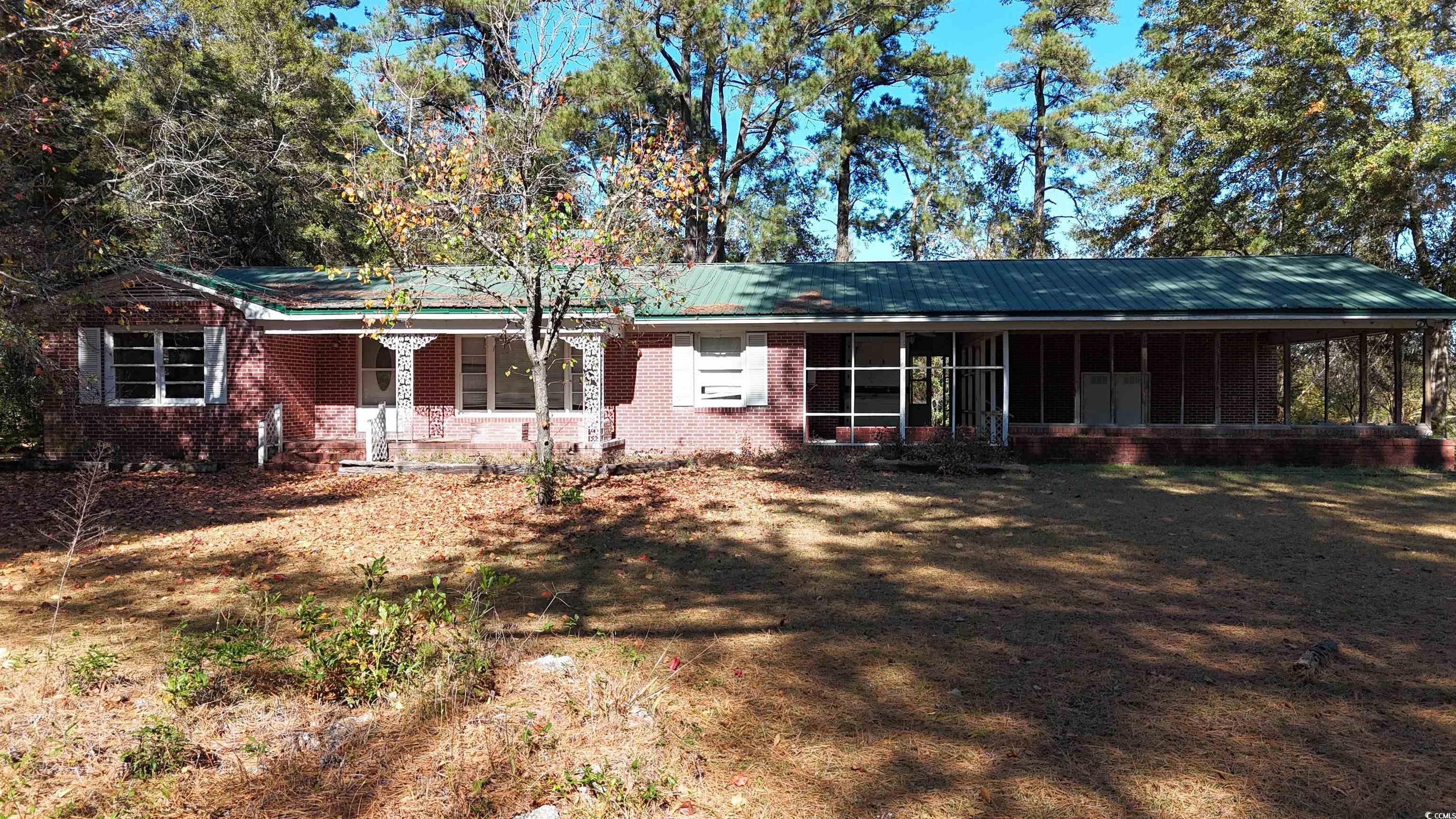 6800 State Rd S-26-266 Nichols, SC 29581 - Photo 19 of 20 Ranch-style house featuring a porch and brick siding