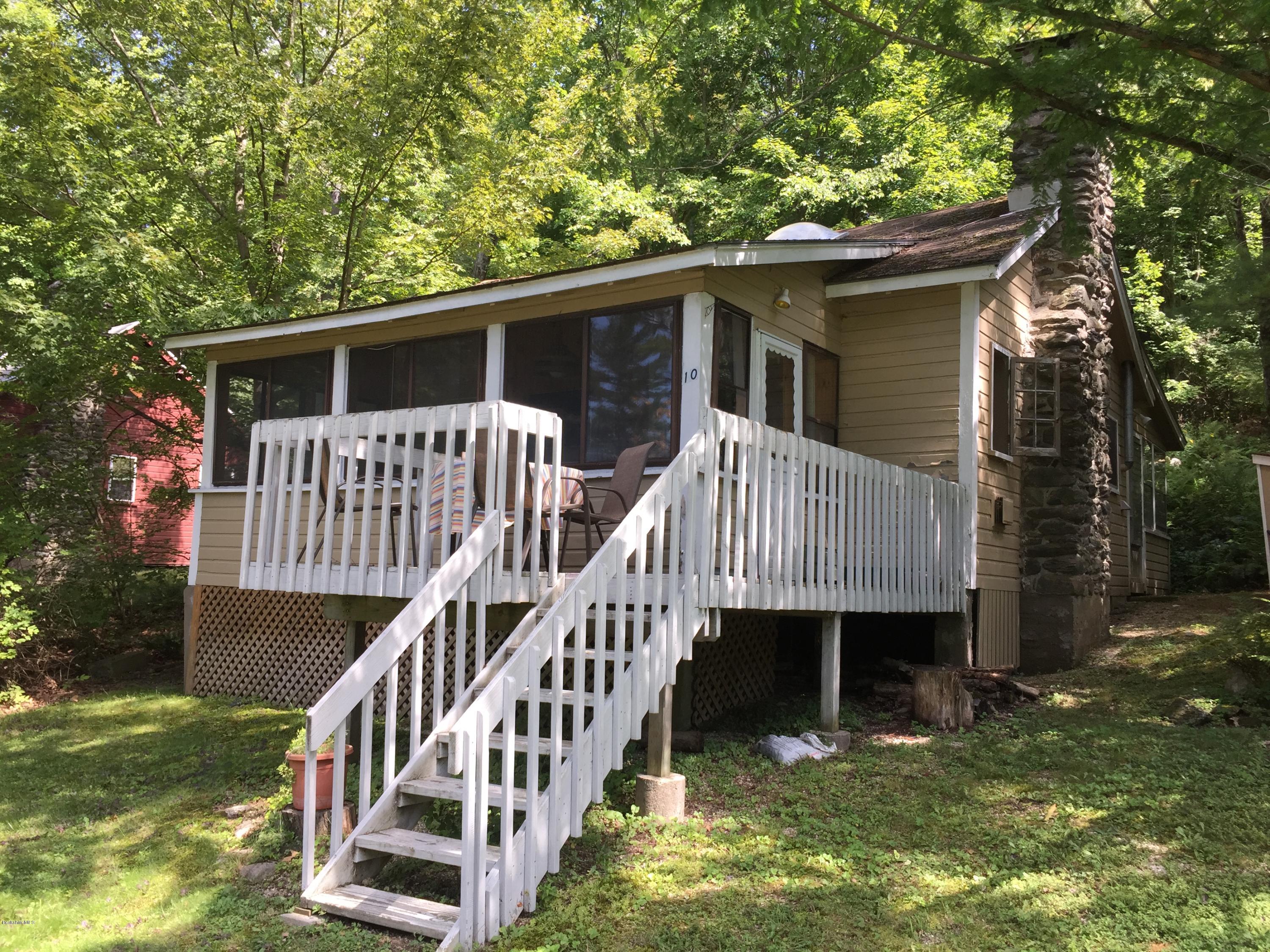 10 Mahkeenac Heights Road Stockbridge, MA 01262 - Photo 3 of 22 a view of a house with a deck front of house