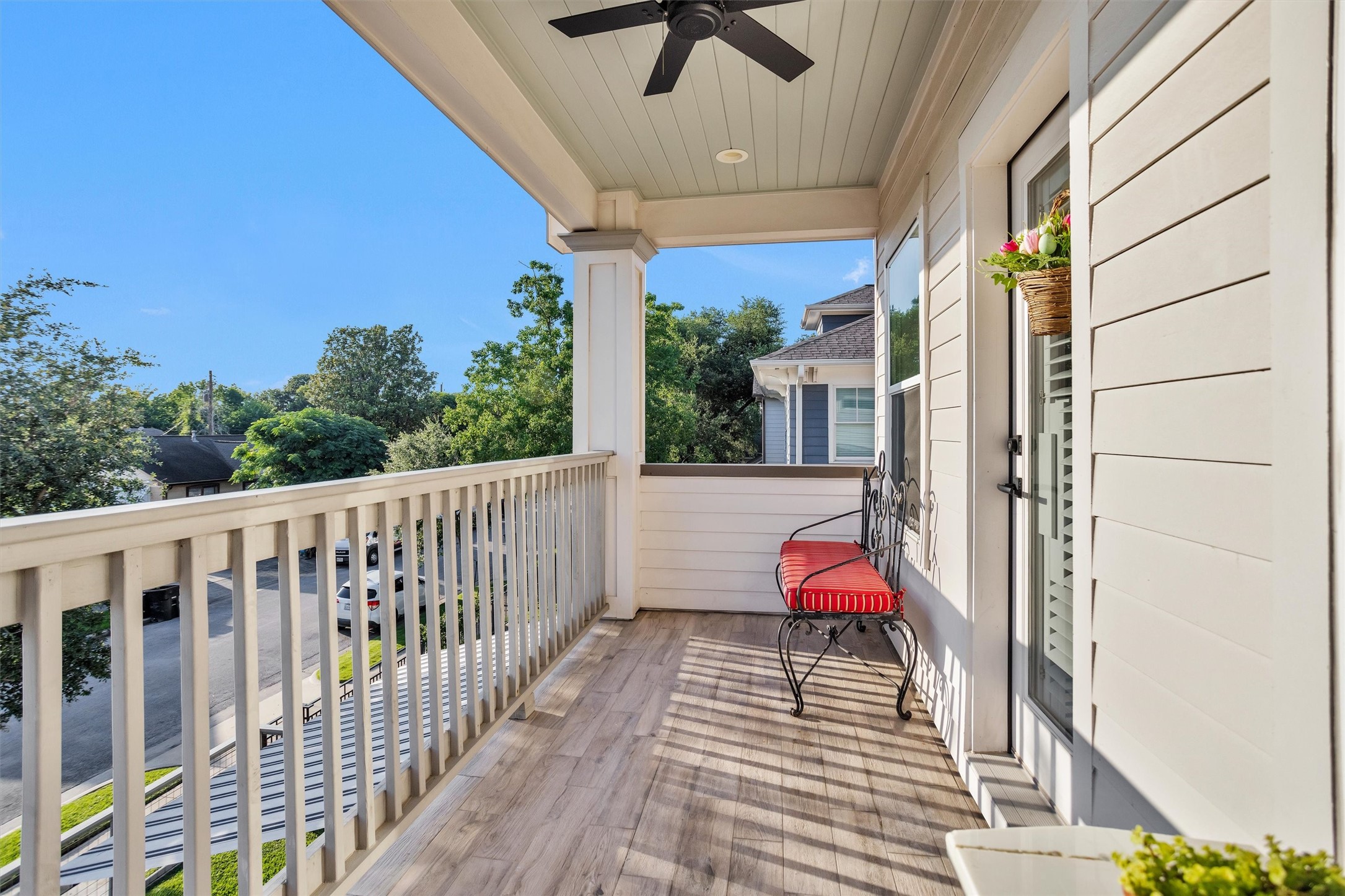1202 Walton Street Houston, TX 77009 - Photo 21 of 32 Charming Covered Balcony—The Perfect Place to Enjoy Morning Coffee, Unwind in the Evening, or Take in the Neighborhood Views.