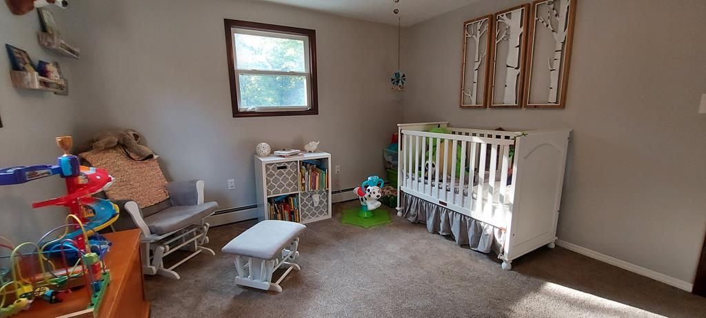 1647 Hells Kitchen Road Stoneboro, PA 16153 - Photo 11 of 19 a room with lots of white furniture and a window