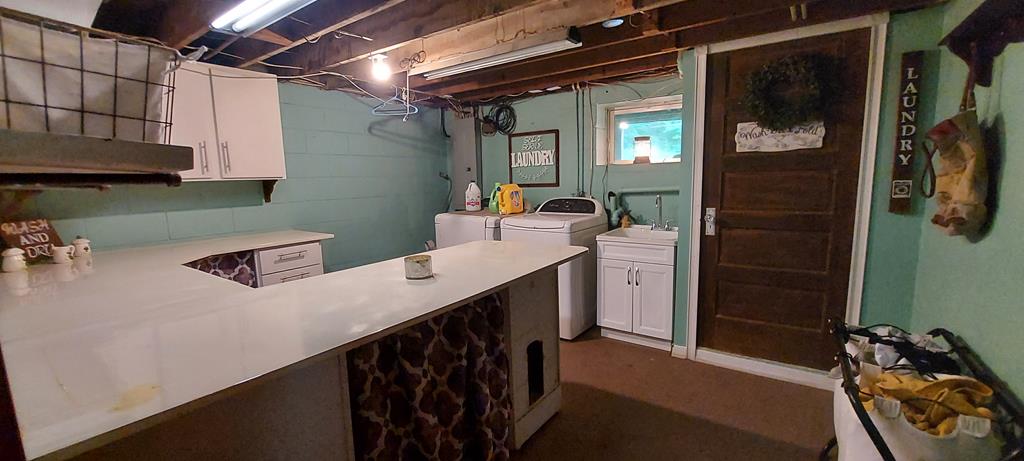 1647 Hells Kitchen Road Stoneboro, PA 16153 - Photo 10 of 19 a utility room with dryer and washer
