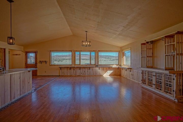 1810 Forbes Park Road Fort Garland, CO 81133 - Photo 7 of 25 a view of empty room with wooden floor