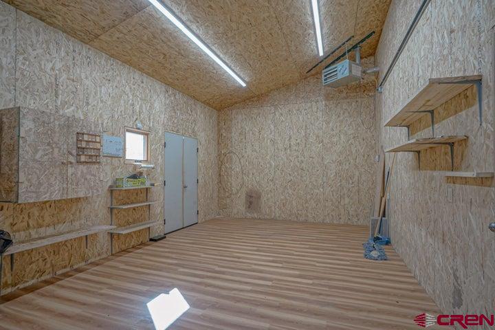1810 Forbes Park Road Fort Garland, CO 81133 - Photo 8 of 25 a view of a hallway with wooden floor