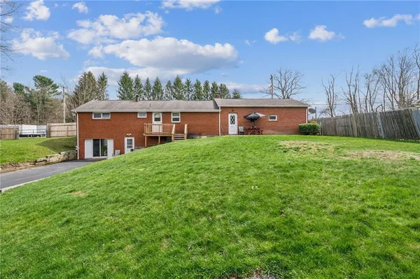 a house view with a garden space