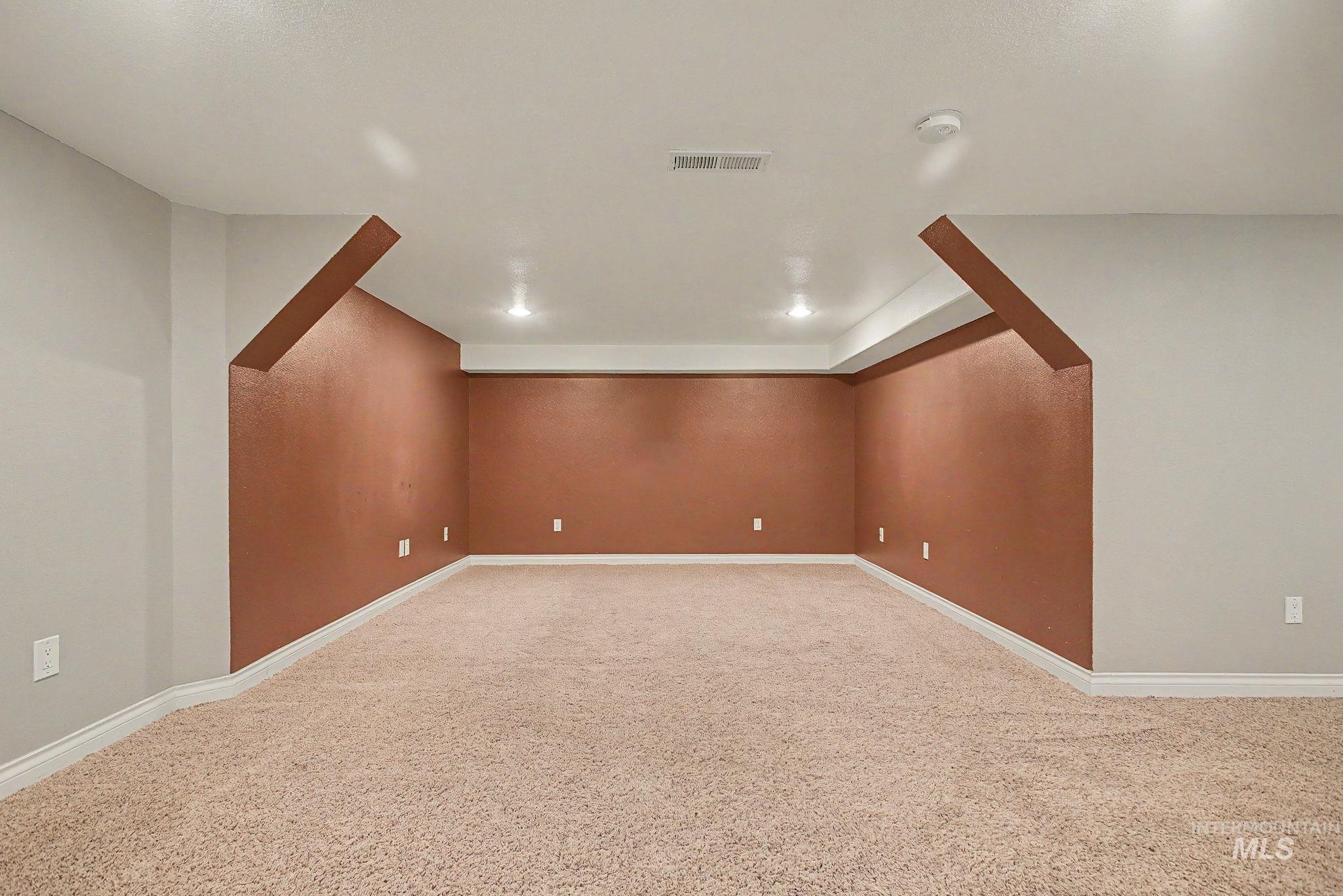 3314 6th Street Lewiston, ID 83501 - Photo 30 of 50 Carpeted room featuring recessed lighting and a color-block wall design