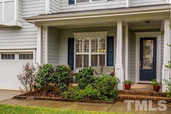 1144 Chapanoke Road Raleigh, NC 27603 - Photo 2 of 22 a front view of a house with garden
