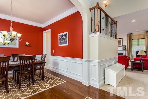 1144 Chapanoke Road Raleigh, NC 27603 - Photo 3 of 22 a dining room with furniture and a rug