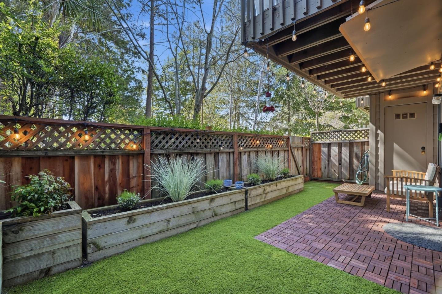 311 Bean Creek Road, Unit 301 Scotts Valley, CA 95066 - Photo 23 of 26 a garden view with a seating space