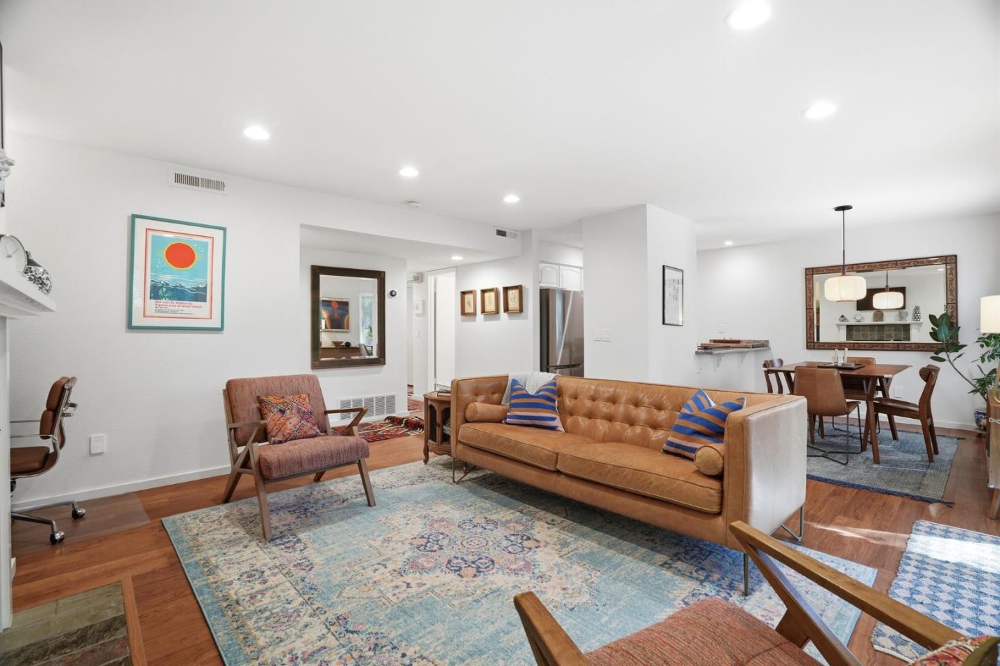 311 Bean Creek Road, Unit 301 Scotts Valley, CA 95066 - Photo 7 of 26 a living room with furniture and a rug