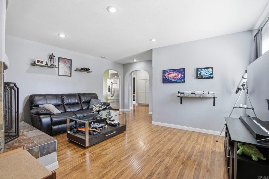 1736 San Pasqual Valley Road Escondido, CA 92027 - Photo 15 of 34 a living room with furniture and wooden floor