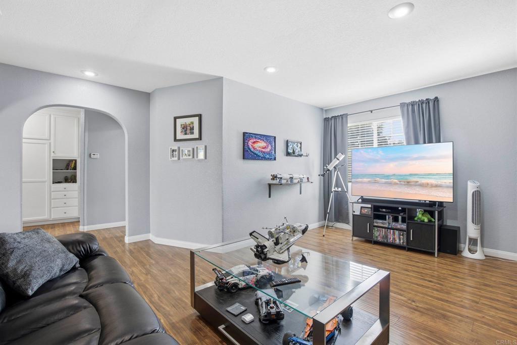 1736 San Pasqual Valley Road Escondido, CA 92027 - Photo 16 of 34 a living room with furniture and wooden floor