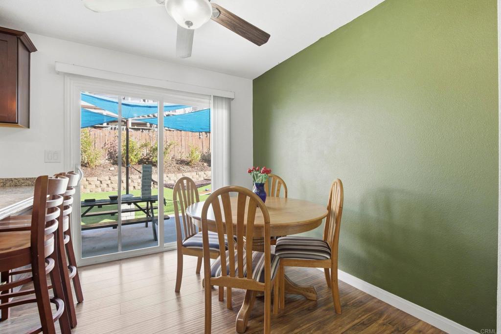 1736 San Pasqual Valley Road Escondido, CA 92027 - Photo 18 of 34 a view of a dining room with furniture window and outside view