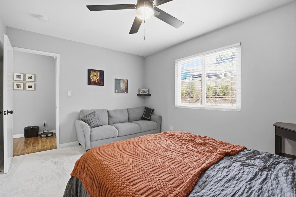 1736 San Pasqual Valley Road Escondido, CA 92027 - Photo 26 of 34 a bedroom with bed and a window