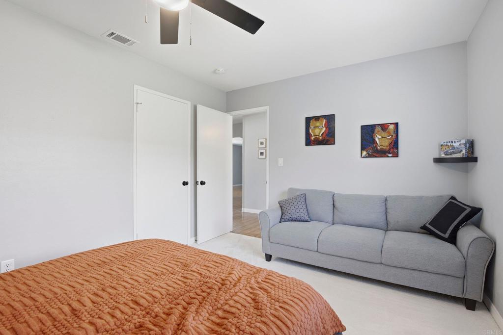 1736 San Pasqual Valley Road Escondido, CA 92027 - Photo 27 of 34 a living room with a couch