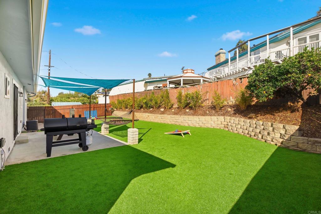 1736 San Pasqual Valley Road Escondido, CA 92027 - Photo 33 of 34 a view of a backyard with sitting area