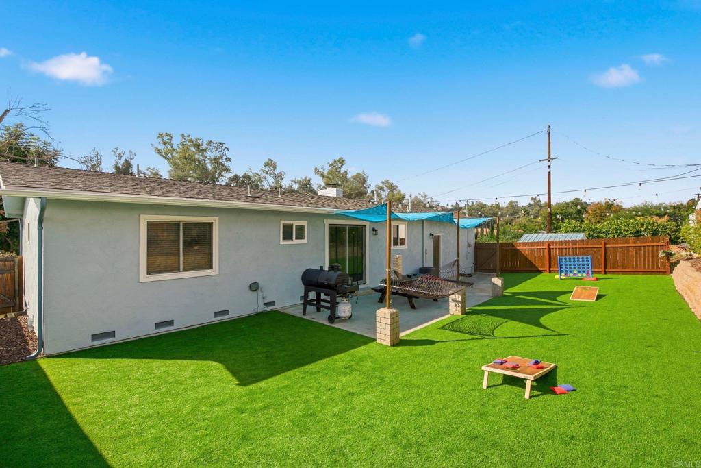 1736 San Pasqual Valley Road Escondido, CA 92027 - Photo 34 of 34 a backyard of a house with seating space
