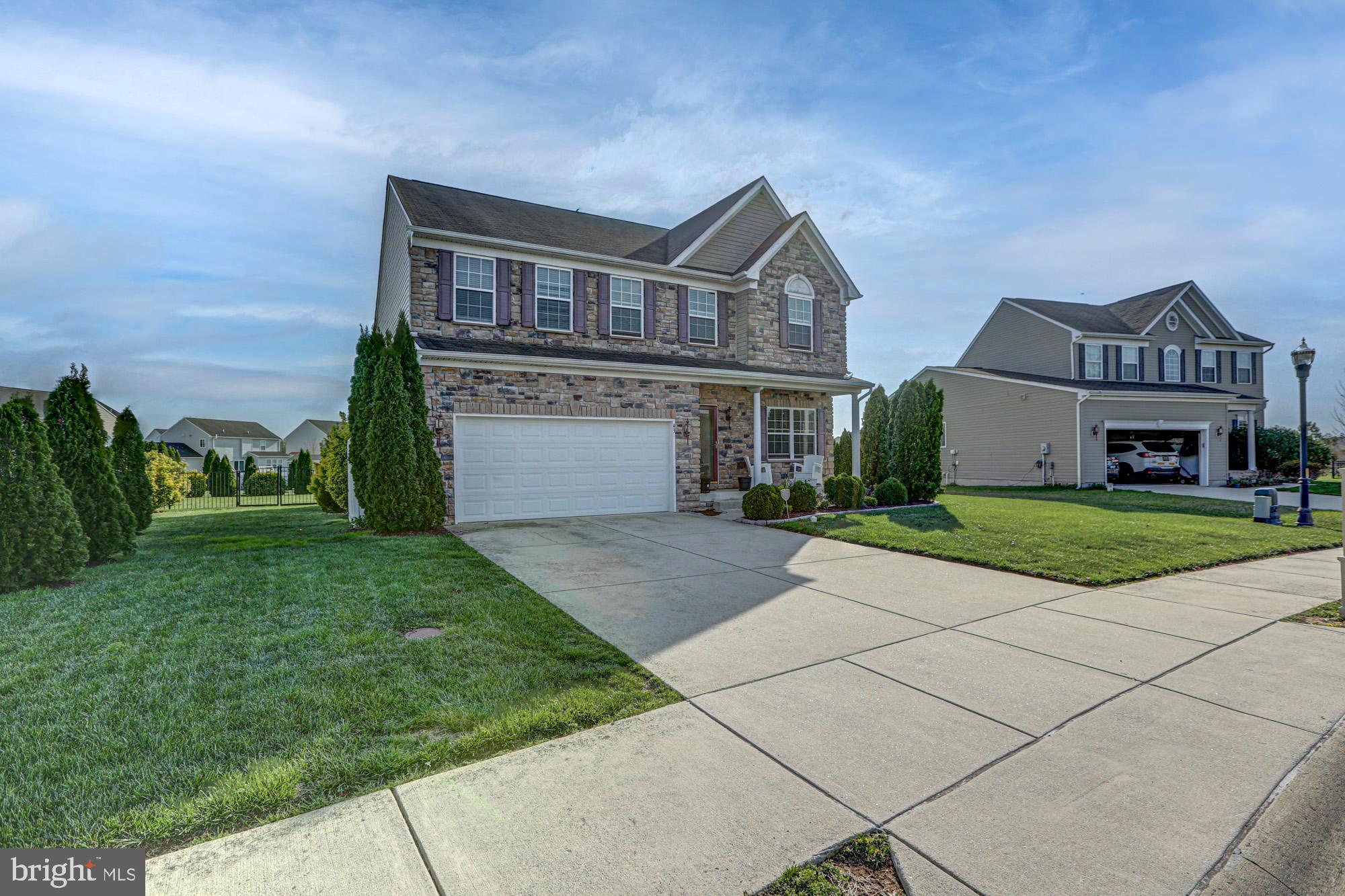 43 Autumn Terrace Magnolia, DE 19962 - Photo 16 of 86 a front view of a house with a yard and garage