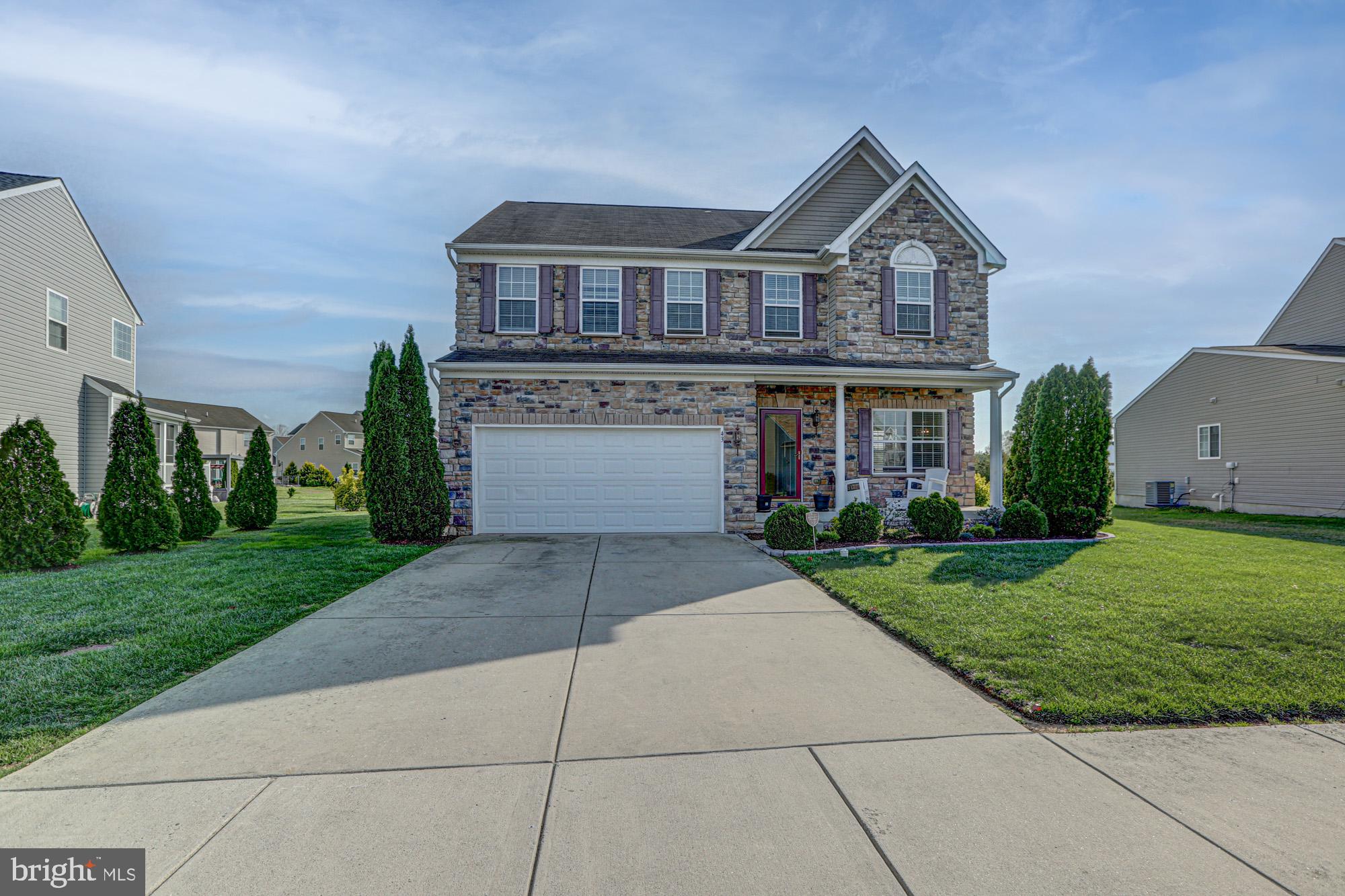 43 Autumn Terrace Magnolia, DE 19962 - Photo 17 of 86 a front view of a house with a yard and trees