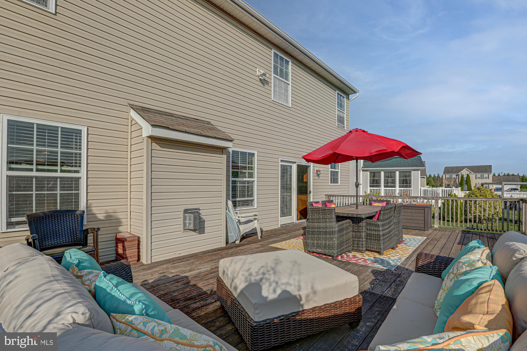 43 Autumn Terrace Magnolia, DE 19962 - Photo 28 of 86 a view of a patio with couches chairs under an umbrella