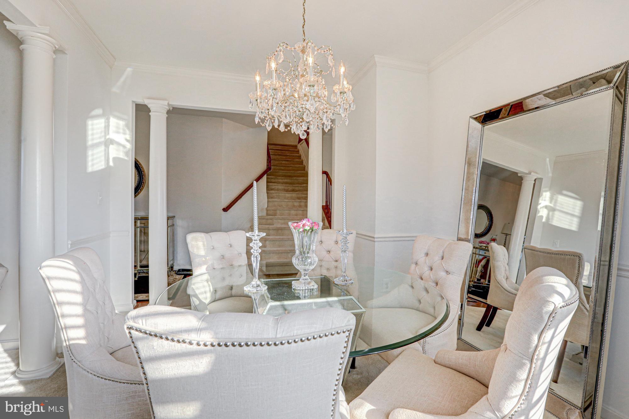 43 Autumn Terrace Magnolia, DE 19962 - Photo 39 of 86 a living room with furniture and a chandelier