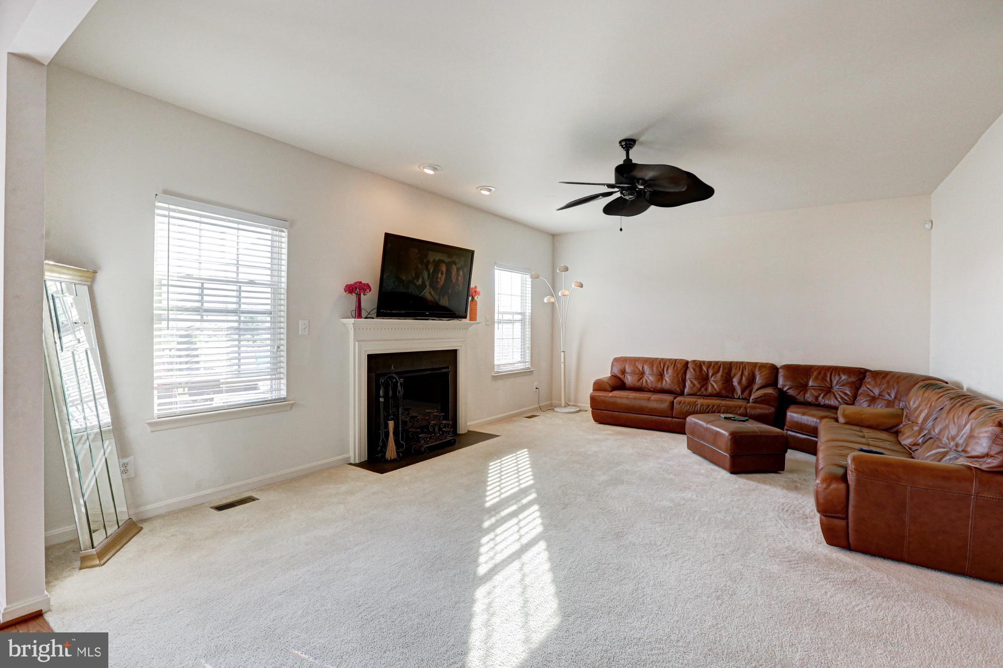 43 Autumn Terrace Magnolia, DE 19962 - Photo 51 of 86 a living room with furniture fireplace and a window
