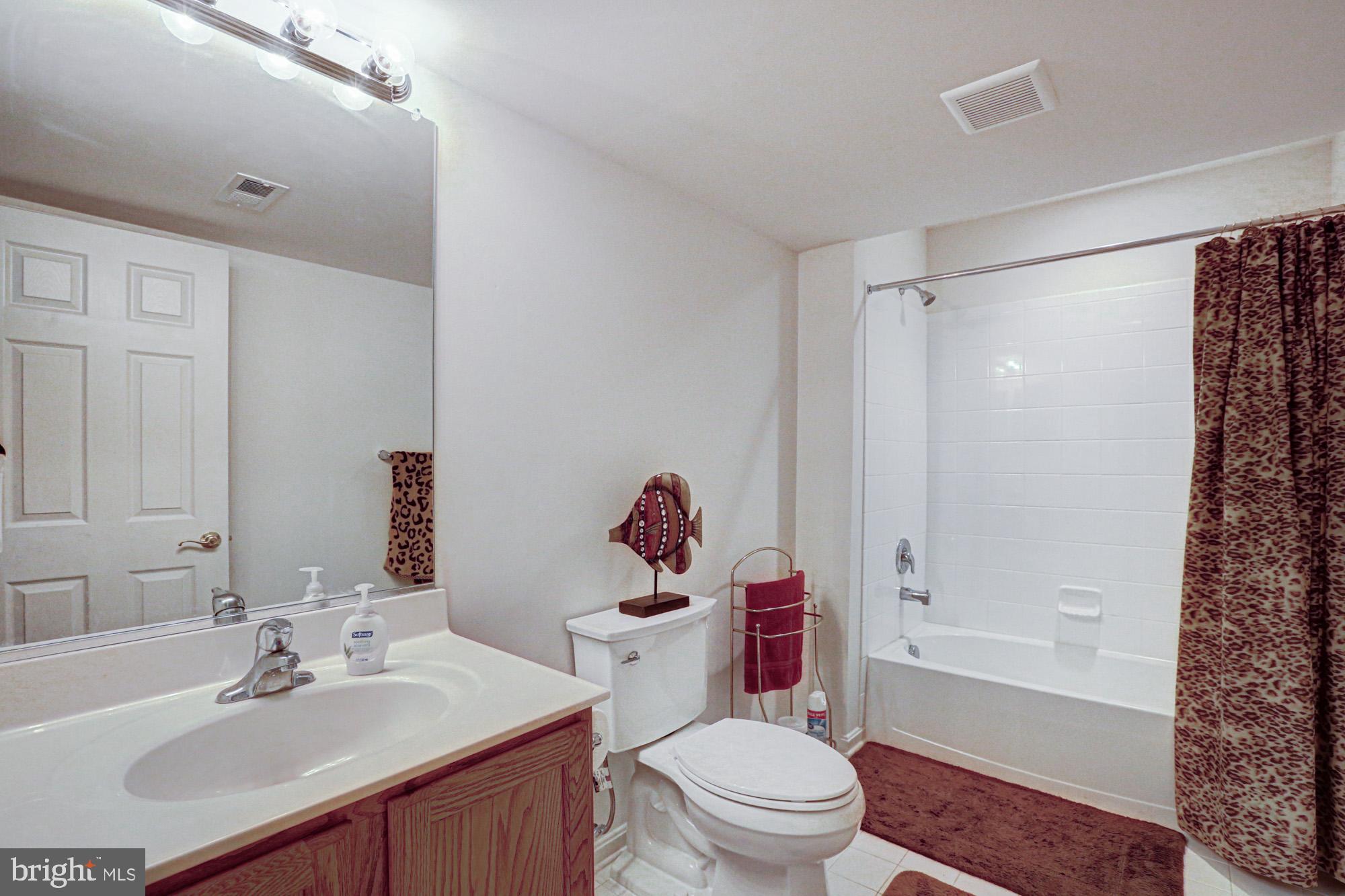 43 Autumn Terrace Magnolia, DE 19962 - Photo 83 of 86 a bathroom with a sink toilet and shower
