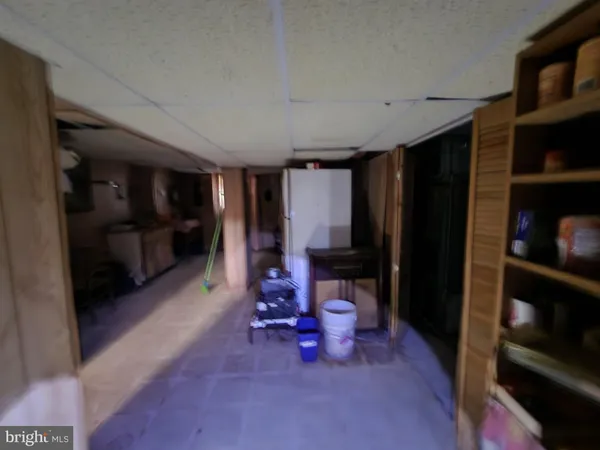 a room with furniture and a window