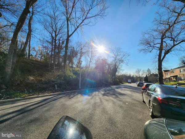 a view of street with sign board
