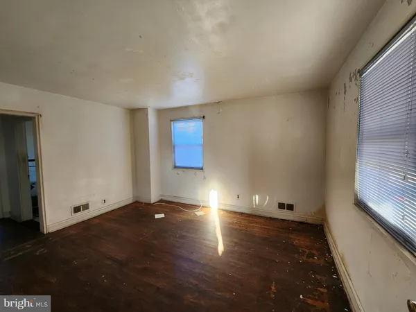 an empty room with windows