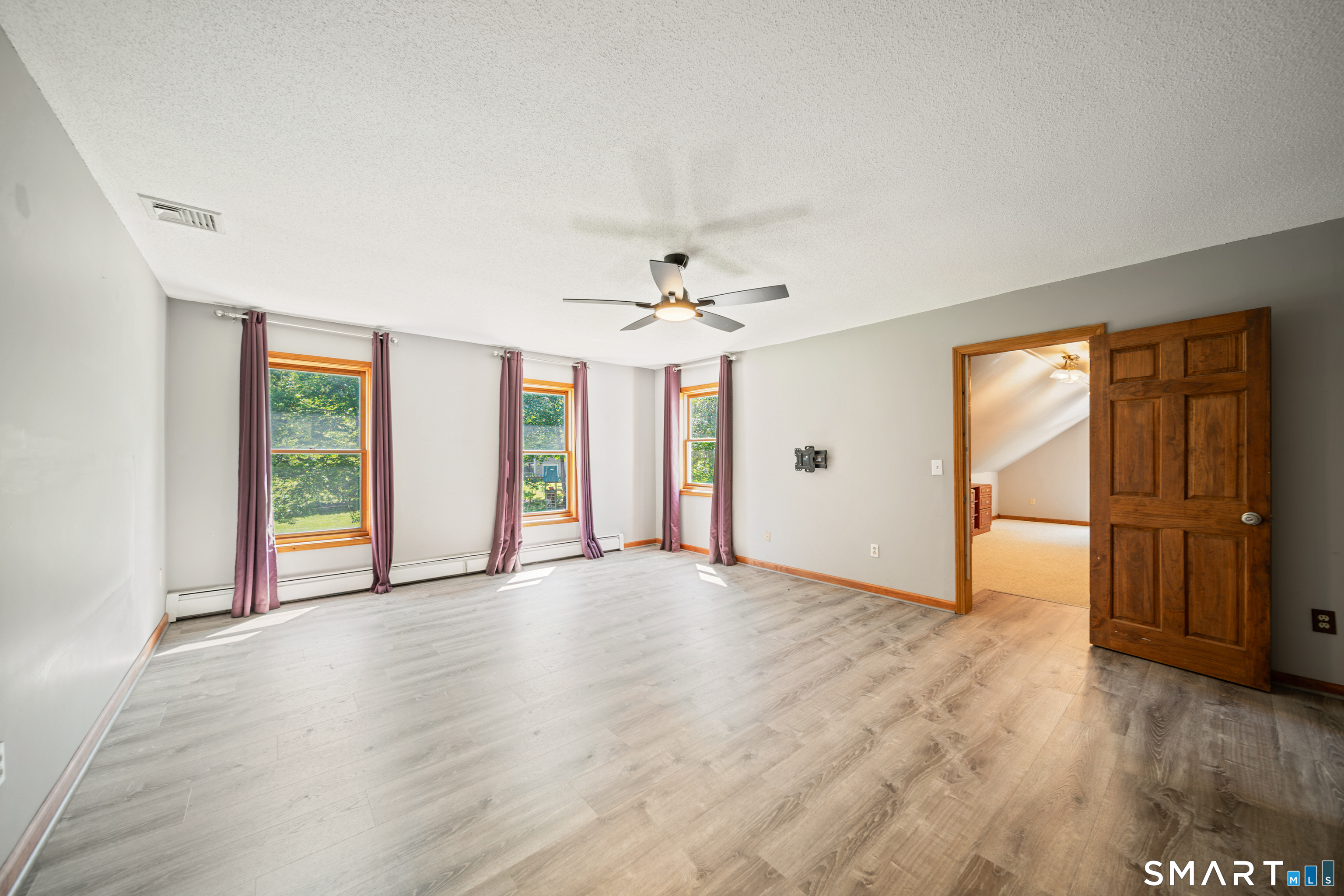 225 Bethmour Road Bethany, CT 06524 - Photo 13 of 30 Primary Suite with room over garage that can be an amazing walk-in closet. There is also another large closet that can be incorporated into the existing full bath to make an updated large primary full bath down the road