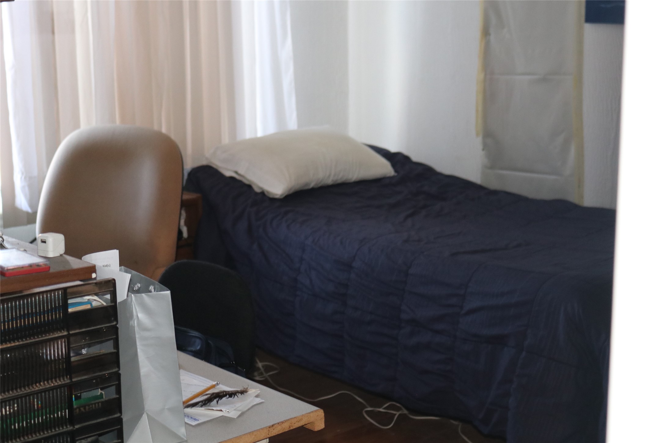 17002 Hall Shepperd Road Houston, TX 77049 - Photo 2 of 6 a bedroom with a bed and a window