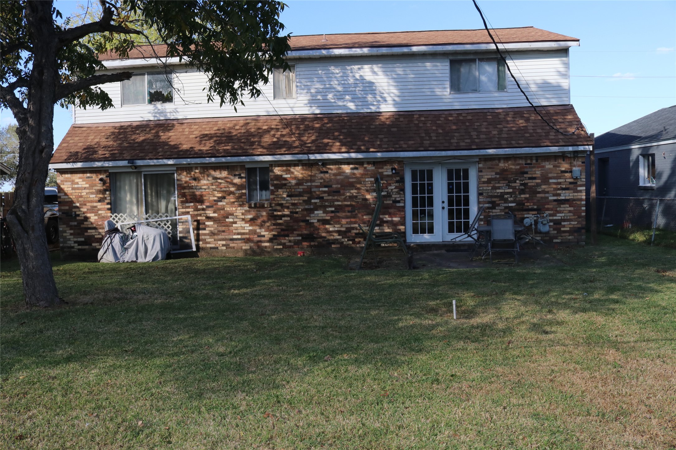 17002 Hall Shepperd Road Houston, TX 77049 - Photo 4 of 6 a front view of a house with garden