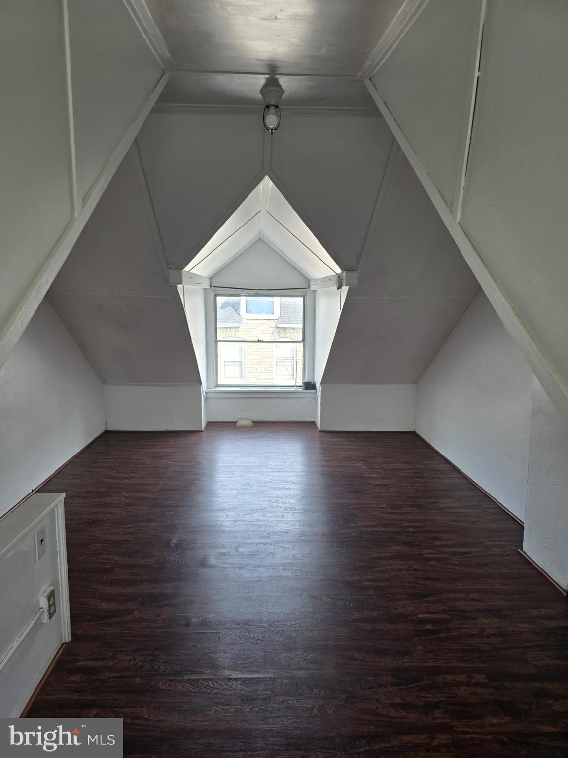 940 Mulberry Street Reading, PA 19604 - Photo 8 of 8 an empty room with wooden floor and windows