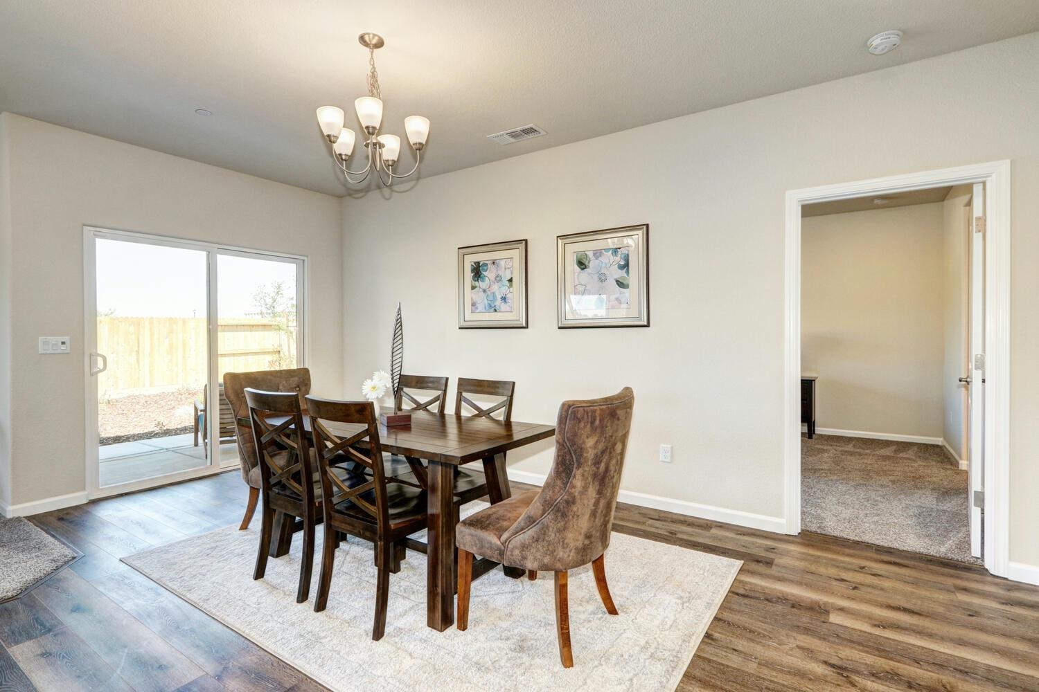 1071 Hogan Road Galt, CA 95632 - Photo 13 of 17 *Dinning Area with Slider Provides Access to Covered Patio