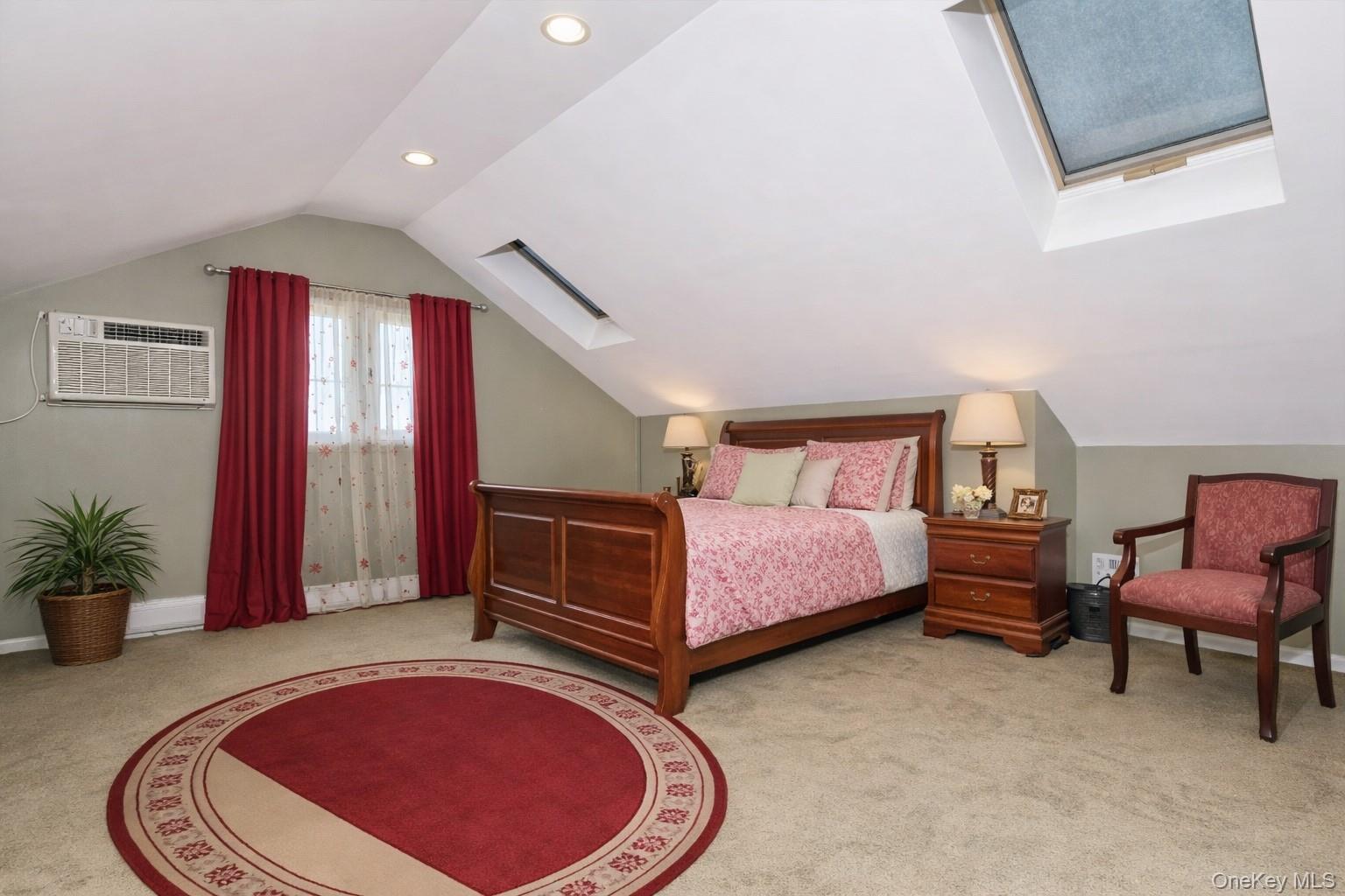 59 Prairie Avenue Suffern, NY 10901 - Photo 13 of 21 a spacious bedroom with a bed and chair