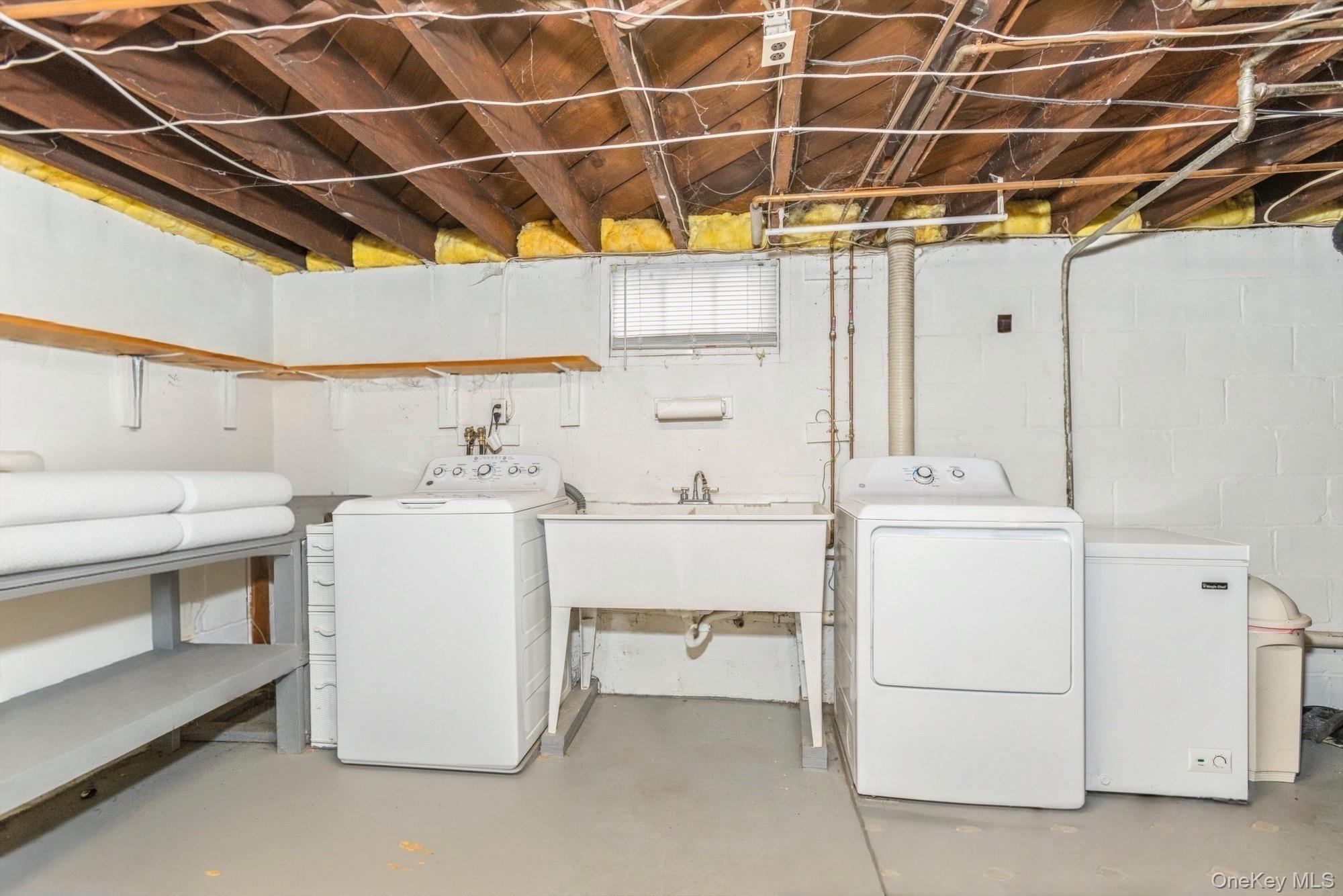 59 Prairie Avenue Suffern, NY 10901 - Photo 20 of 21 a utility room with dryer and washer